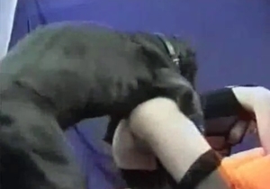 Stockings-clad chick fucked by a black dog